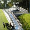 Holy Cross College, MA - Lacrosse Field, 7 row high, 84' long elevated beam design grandstand seating 350 with an 8' x 24' press box
