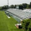 Holy Cross College Soccer Field, Worcester, MA - Two sided elevated beam design grandstand, 9 rows high, 294' long seating 1,200 at soccer field side, 3 rows, 294' long, seating 300 on track side and a two sided 10' x 30' press box
