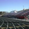 Clem Lemire Stadium, Manchester Memorial HS, NH - 15 row high, 246' long elevated beam design grandstand seating 2,000 and an 10' x 68' press box