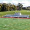 Nichols College, Dudley, MA - 10 row high, 138' long elevated beam design grandstand seating 800 people with an 8' x 30' press box

