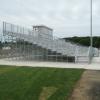 East Greenwich HS, East Greenwich, RI - 15 row high, 121' long elevated angle frame bleacher seating 1,000 and an 8' x 18' press box
