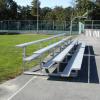 Two side by side 4 row high, 15' long portable bleachers

